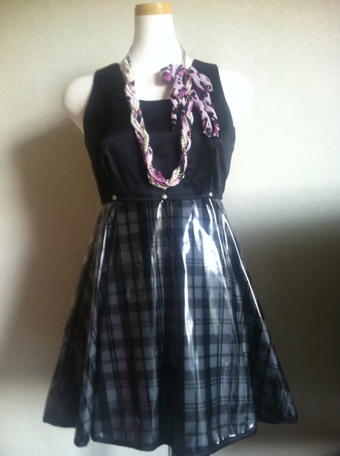 Vintage Gianni Versace black and check pattern vinyl dress with medusa motifs. Gorgeous dress Lady Gaga style.